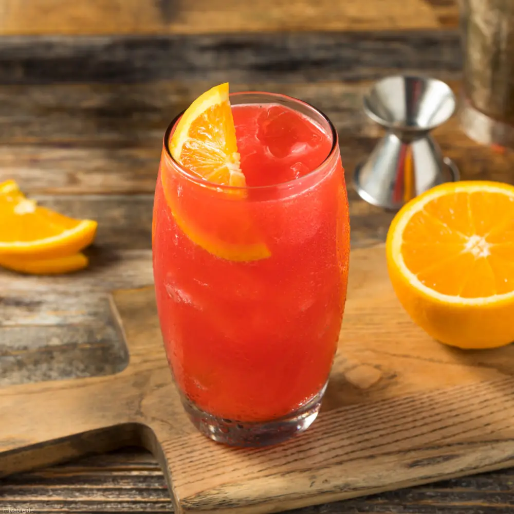 Red Alabama Slammer Drink on a table.